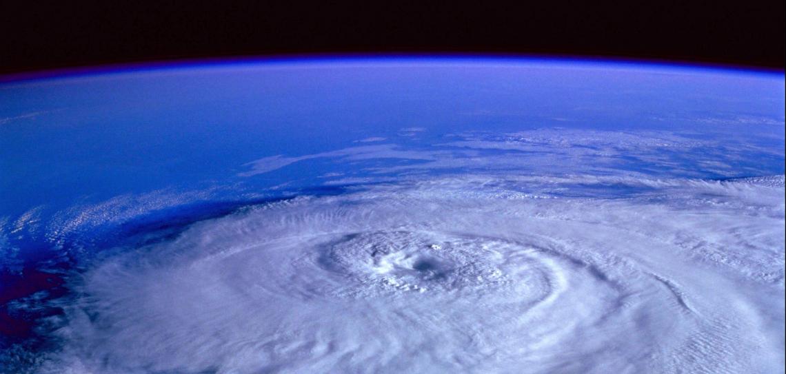 Hurricane forming above earth from space